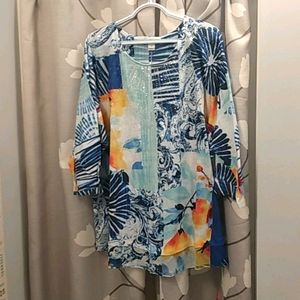 3/4 sleeve multi colored shirt.